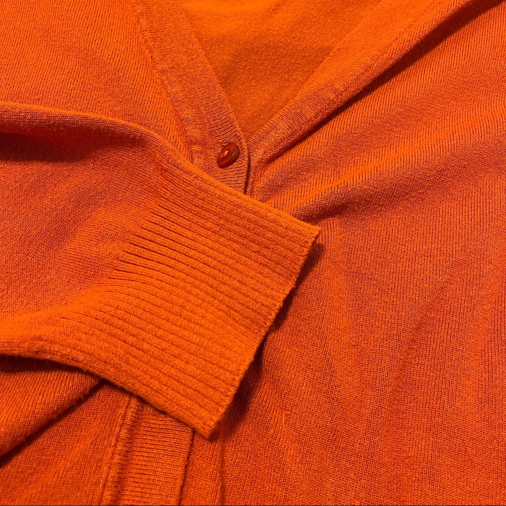 orange cardigan